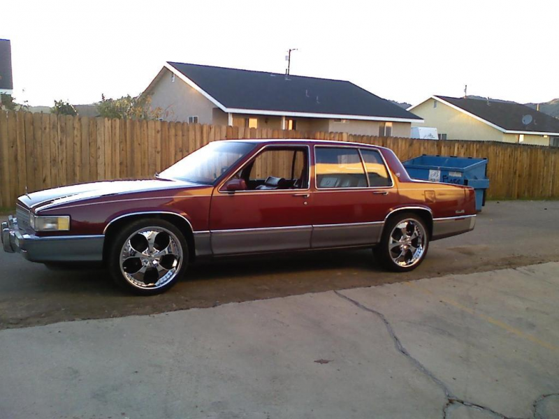 this is my best friends 1991 caddy. On 20's thi...