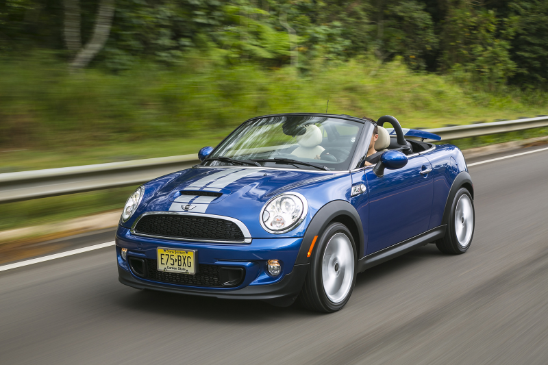 2014 Mini Cooper Roadster Three Quarters Side View In Motion