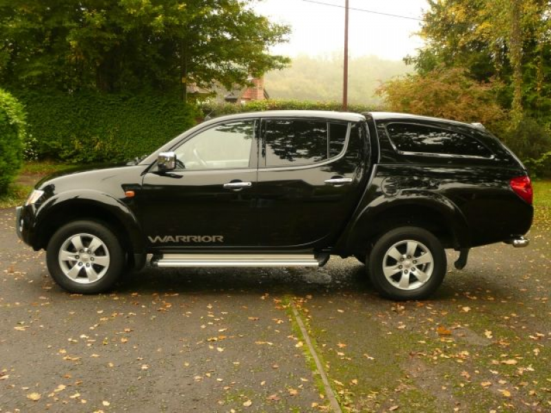 This Black Mitsubishi L200 Warrior has a 5 speed manual gearbox and a ...