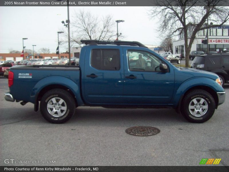 ... to this Electric Blue Metallic 2005 Nissan Frontier Nismo Crew Cab 4x4