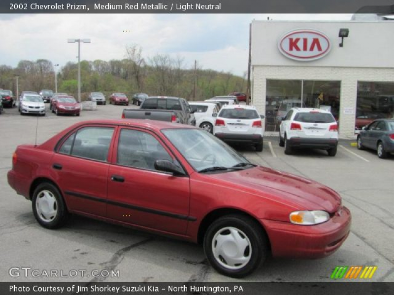 2002 Chevrolet Prizm in Medium Red Metallic. Click to see large photo.