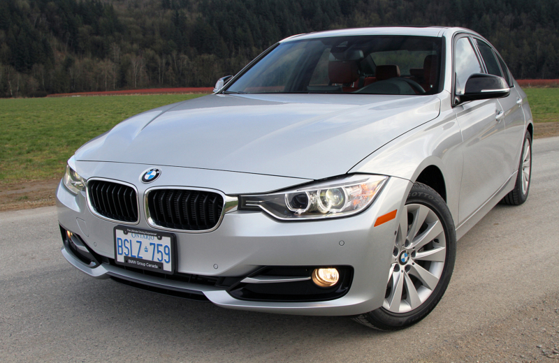 The BMW 328d features Bi-Xenon headlights, a sculpted hood and fenders ...