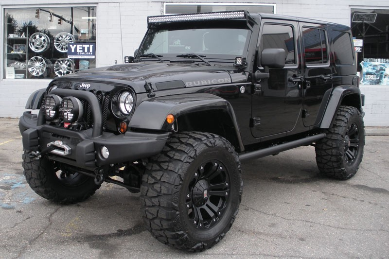 2013 Black Jeep Wrangler Unlimited Rubicon Front Angle