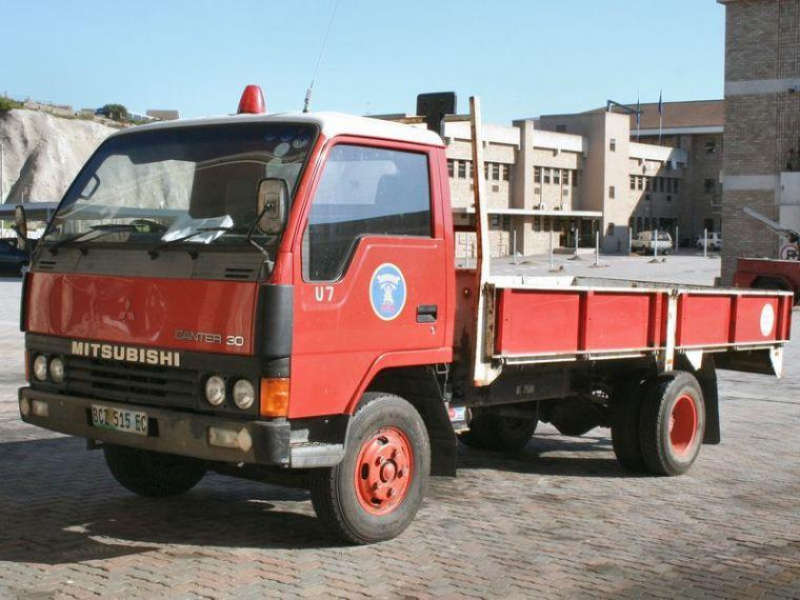 Front Left Red Mitsubishi Canter 30 Truck Picture