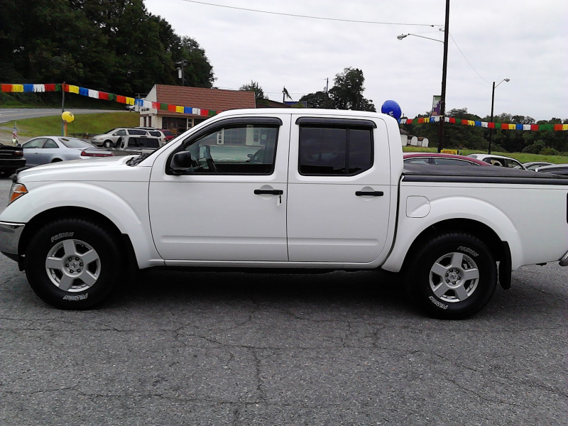Picture of 2006 Nissan Frontier SE Crew Cab 4WD SB w/manual, exterior